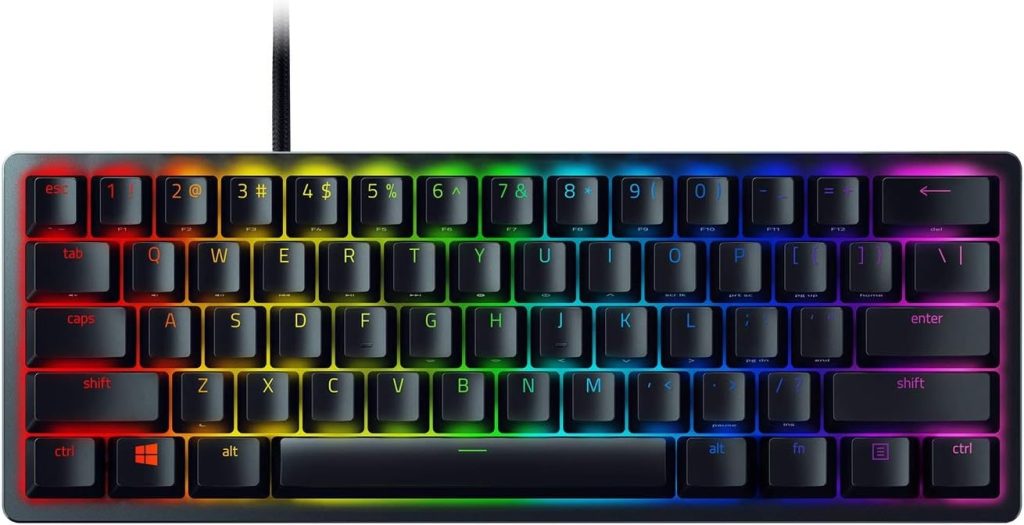 Clavier gaming Razer Huntsman Mini avec rétroéclairage RGB arc-en-ciel sur fond blanc